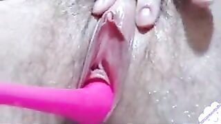 bimbos with unshaved twat tease her vagina with pink toy