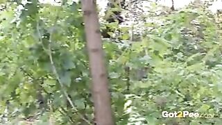 Redheaded Hot Pisses Big And Rough Into Trees